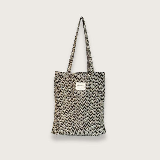 lille tote bag i sildebensmønstret stof håndlavet i spanien af de lar mur - fra Chant du Matin