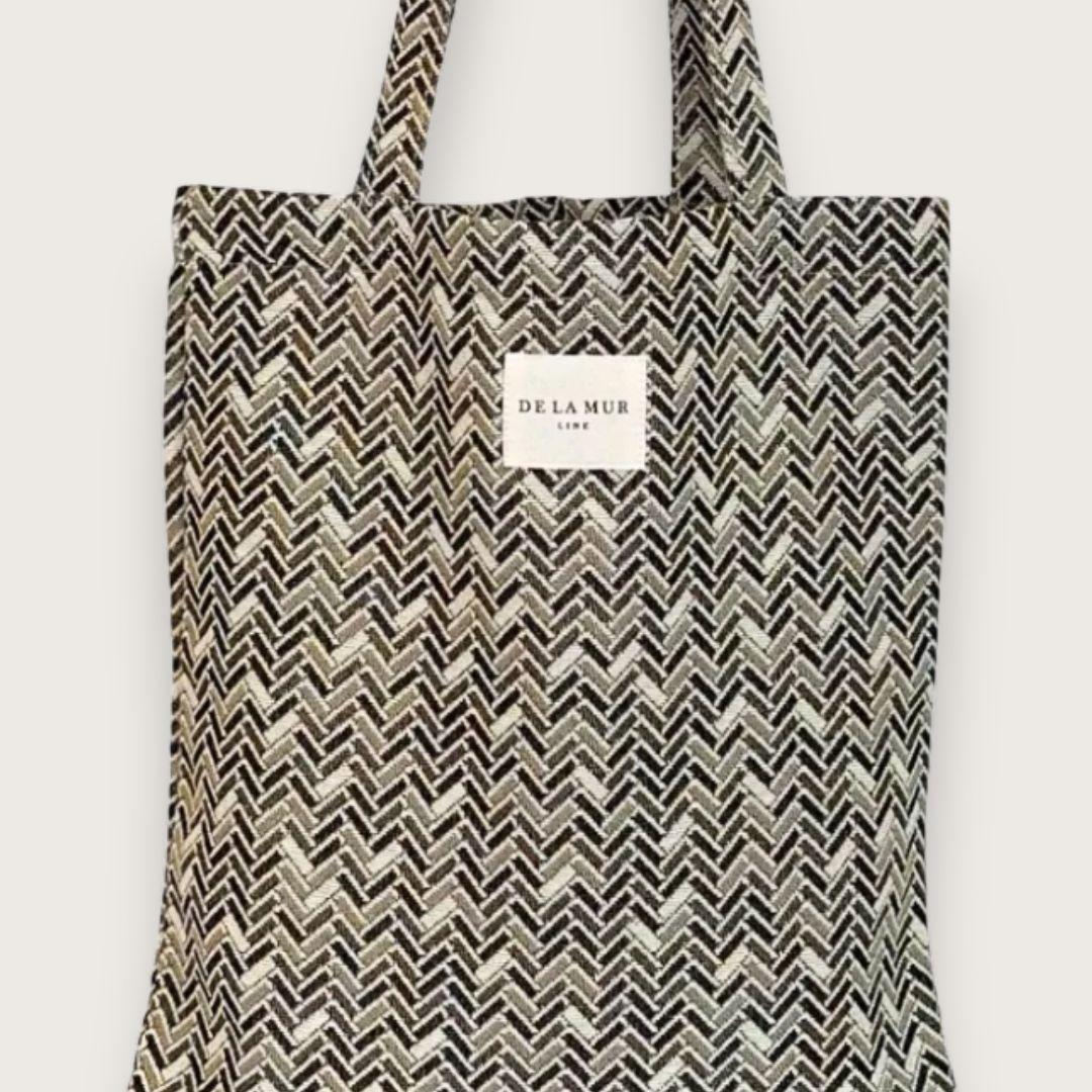 lille tote bag i sildebensmønstret stof håndlavet i spanien af de lar mur - fra Chant du Matin