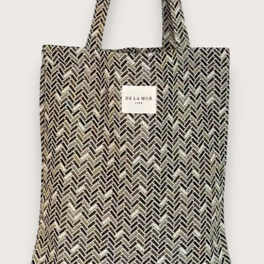 lille tote bag i sildebensmønstret stof håndlavet i spanien af de lar mur - fra Chant du Matin