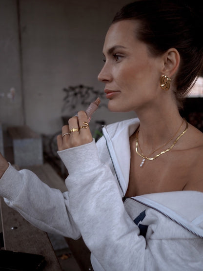 Léonie øreringe – Guldfarvede
