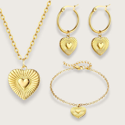 Marisol armbånd med hjertevedhæng - Guldbelagt