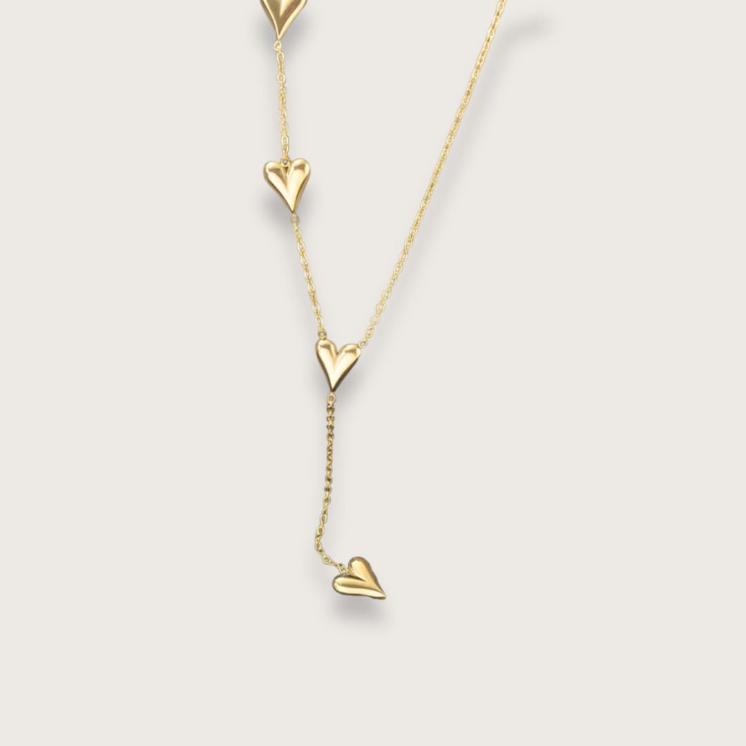 Inès smykkesæt – Guldbelagt hjertehalskæde og hjertearmbånd