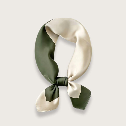 Minimalistisk satintørklæde i i grøn og cremefarvet. Tørklædet er fremstillet af polyester. Kan håndvaskes. Smukt og elegant vadratisk satintørklæde til kvinder.