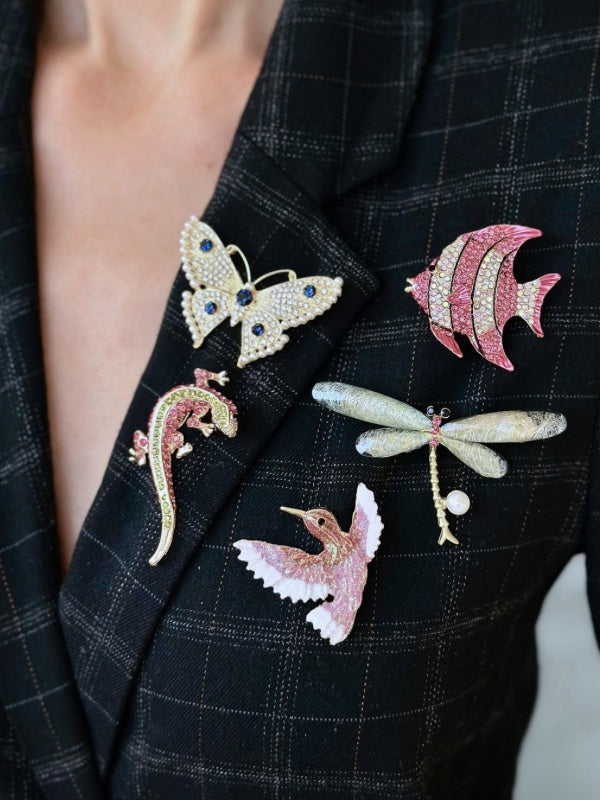Fina fiske-broche med pink rhinsten